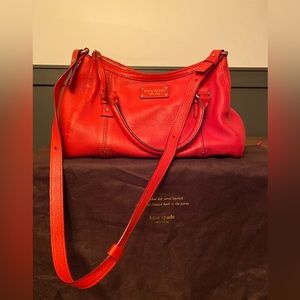 Kate Spade Shoulder bag. Coral red. Polka dot interior. Very good condition.